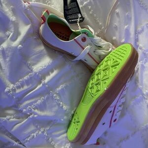 Converse White and Green Sneakers with Sporty Design